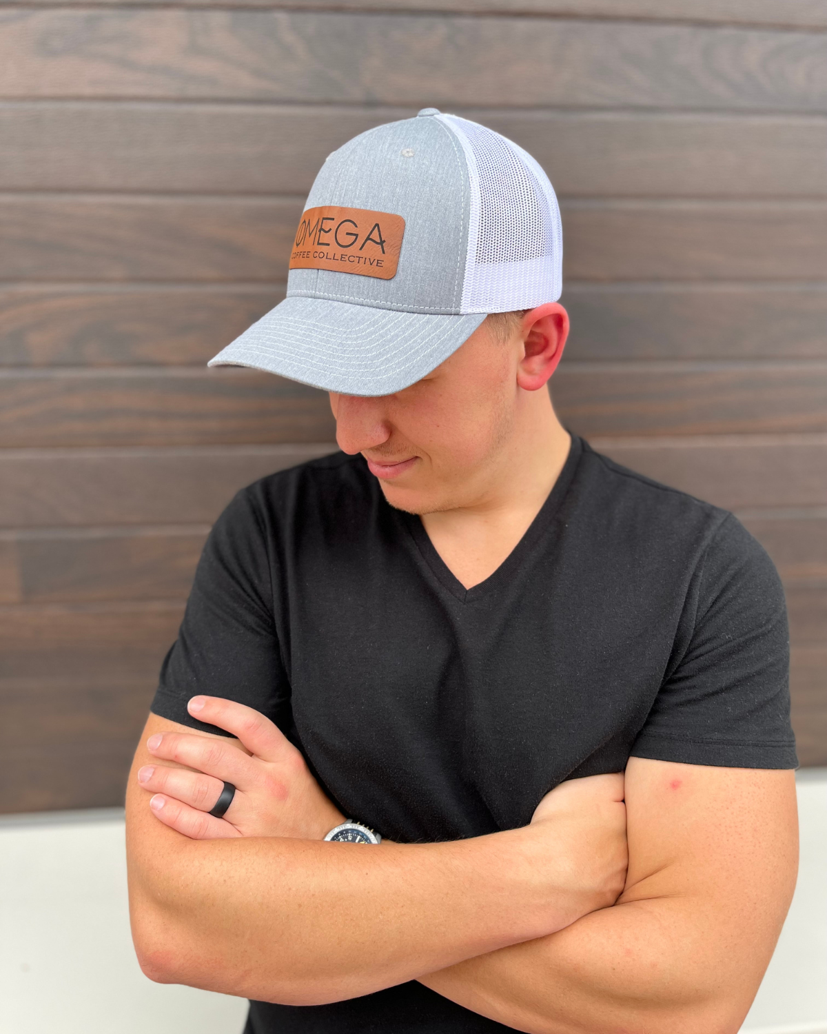 Omega Leather Patch Trucker Hat